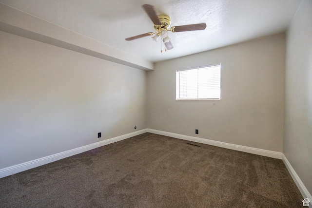 240 E 400 N Unit 28, Logan, UT 84321 - unfurnished room featuring dark carpet and a ceiling fan