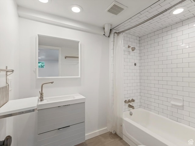 1332 S 200 E, Salt Lake City, UT 84115 - full bathroom featuring vanity, shower / tub combo with curtain, wood finished floors, and recessed lighting