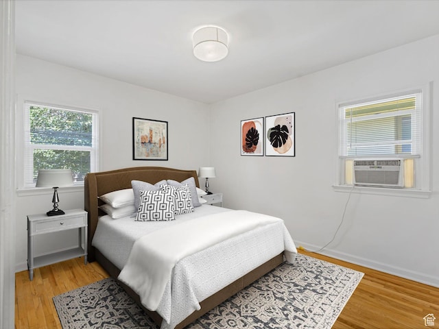 1332 S 200 E, Salt Lake City, UT 84115 - bedroom with cooling unit and light wood-type flooring