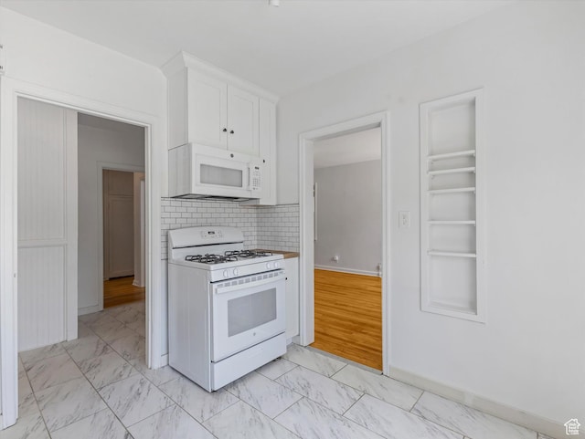 1332 S 200 E, Salt Lake City, UT 84115 - kitchen with white appliances, light marble finish flooring, white cabinets, and backsplash