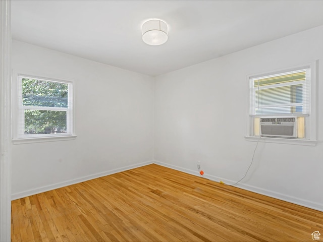 1332 S 200 E, Salt Lake City, UT 84115 - empty room featuring light wood finished floors and cooling unit