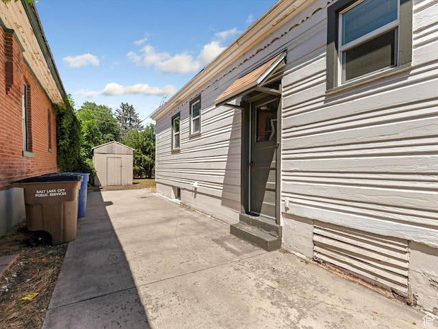 1332 S 200 E, Salt Lake City, UT 84115 - view of patio / terrace with a shed and entry steps