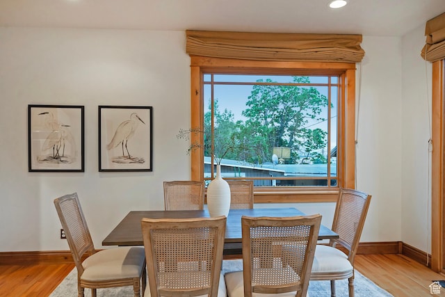427 N J St E, Salt Lake City, UT 84103 - dining area featuring light wood finished floors and recessed lighting