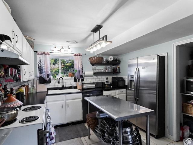 3018 E 4430 S, Salt Lake City, UT 84124 - kitchen with stainless steel appliances, open shelves, white cabinetry, and dark countertops
