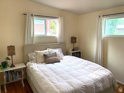 3018 E 4430 S, Salt Lake City, UT 84124 - bedroom with multiple windows and wood finished floors