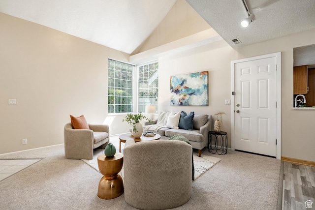 5441 S Spinnaker Row, Taylorsville, UT 84123 - living room featuring light carpet and vaulted ceiling