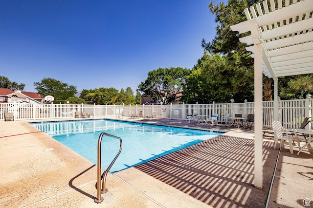 5441 S Spinnaker Row, Taylorsville, UT 84123 - community pool with a patio area