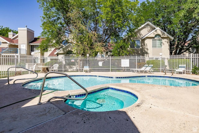 5441 S Spinnaker Row, Taylorsville, UT 84123 - community pool with a patio and a hot tub