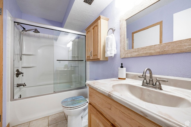 5441 S Spinnaker Row, Taylorsville, UT 84123 - bathroom featuring vanity, a textured wall, and enclosed tub / shower combo