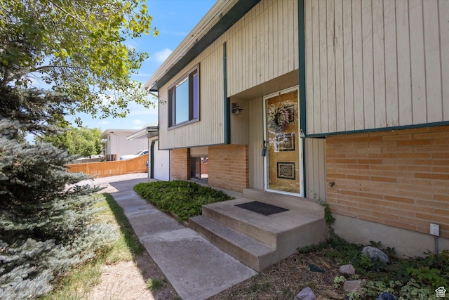 6709 W 3860 S, West Valley City, UT 84128 - property entrance featuring brick siding