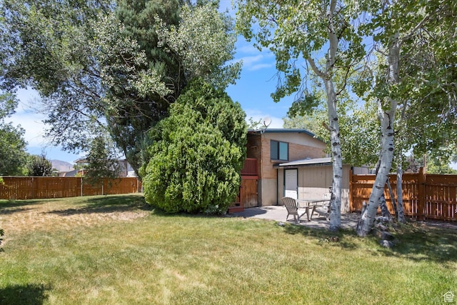 6709 W 3860 S, West Valley City, UT 84128 - fenced backyard with a patio area