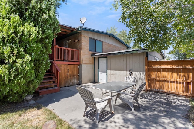 6709 W 3860 S, West Valley City, UT 84128 - view of patio / terrace featuring outdoor dining area and stairs