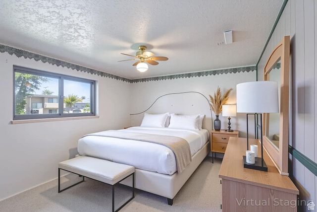 6709 W 3860 S, West Valley City, UT 84128 - bedroom featuring a textured ceiling, light colored carpet, and ceiling fan