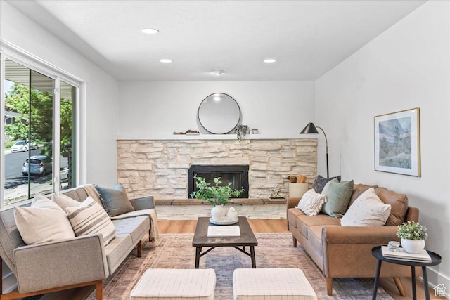 787 S 1680 E, Pleasant Grove, UT 84062 - living room with wood finished floors, a stone fireplace, and recessed lighting