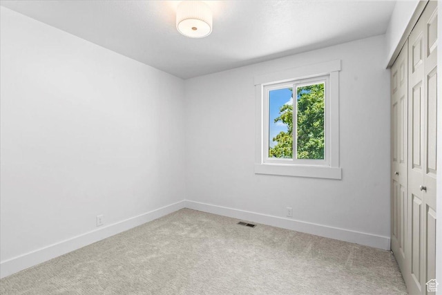 787 S 1680 E, Pleasant Grove, UT 84062 - unfurnished bedroom featuring a closet and carpet flooring
