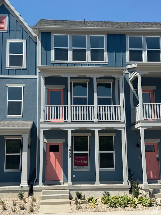 1456 N 1875 W Unit 147, Layton, UT 84041 - traditional home featuring a balcony and board and batten siding