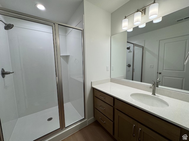 1456 N 1875 W Unit 147, Layton, UT 84041 - bathroom featuring wood finished floors, a shower stall, and vanity