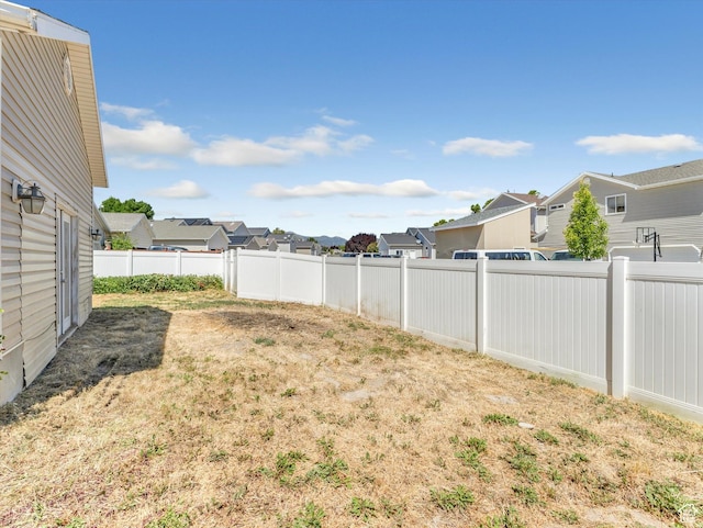 4049 E Dillons Dr N, Eagle Mountain, UT 84005 - fenced backyard with a residential view