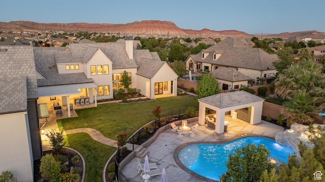 2916 S 300 E, Washington, UT 84780 - view of pool featuring a patio area, a fenced backyard, a gazebo, and a mountain view