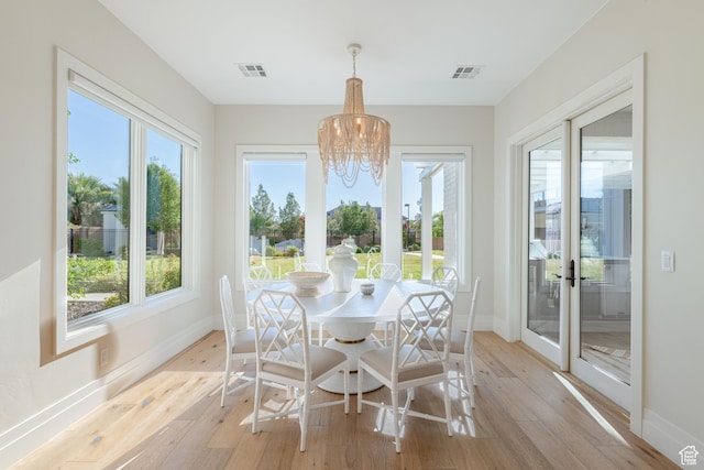 2916 S 300 E, Washington, UT 84780 - sunroom featuring a chandelier, healthy amount of natural light, and french doors