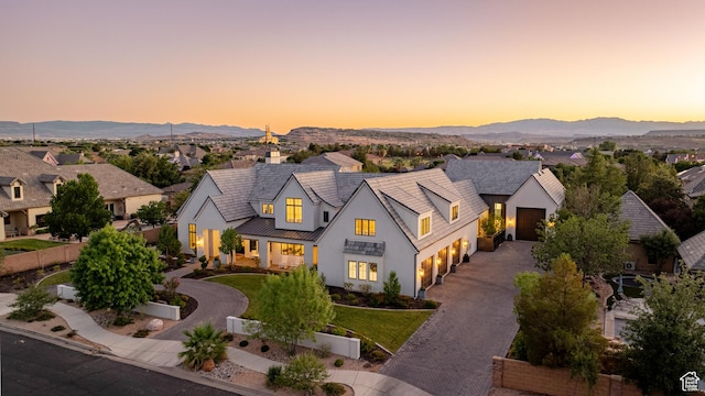 2916 S 300 E, Washington, UT 84780 - modern farmhouse style home with driveway, a garage, stucco siding, and a residential view