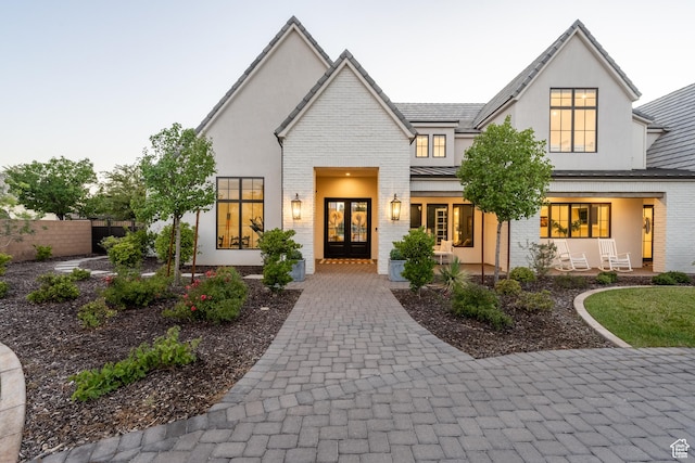 2916 S 300 E, Washington, UT 84780 - view of front of property with french doors, brick siding, and stucco siding