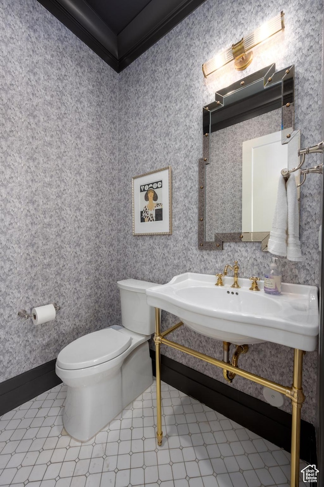 2916 S 300 E, Washington, UT 84780 - half bathroom featuring ornamental molding and tile patterned floors