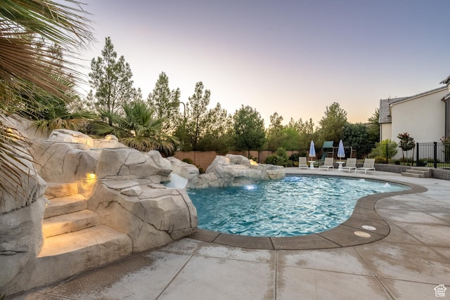 2916 S 300 E, Washington, UT 84780 - pool at dusk featuring a patio area