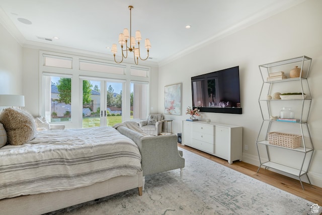 2916 S 300 E, Washington, UT 84780 - bedroom with ornamental molding, french doors, a chandelier, light wood-type flooring, and access to exterior