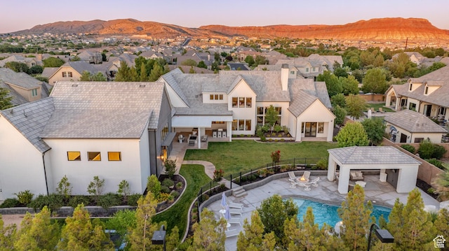 2916 S 300 E, Washington, UT 84780 - aerial view at dusk of a residential view and a mountain view