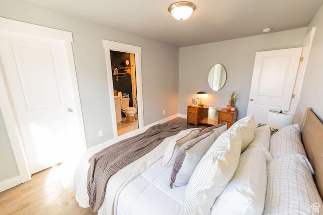 7390 N Pawnee Rd, Eagle Mountain, UT 84005 - bedroom with light wood-type flooring and baseboards