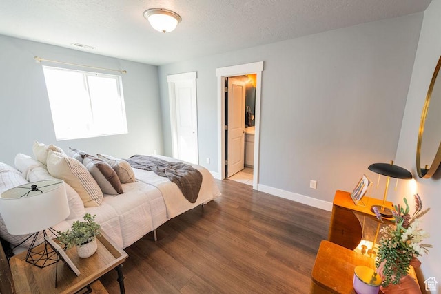 7390 N Pawnee Rd, Eagle Mountain, UT 84005 - bedroom with wood finished floors and ensuite bathroom