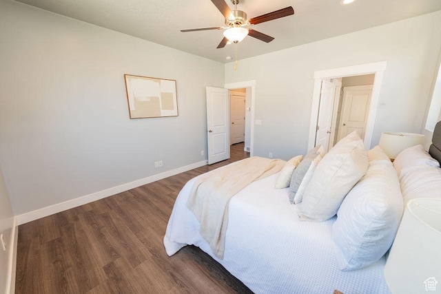 7390 N Pawnee Rd, Eagle Mountain, UT 84005 - bedroom with dark wood-style flooring, ceiling fan, and recessed lighting