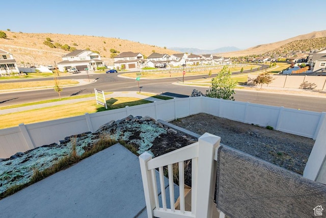 7390 N Pawnee Rd, Eagle Mountain, UT 84005 - view of yard with a residential view and a mountain view