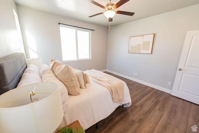 7390 N Pawnee Rd, Eagle Mountain, UT 84005 - bedroom featuring wood finished floors and a ceiling fan