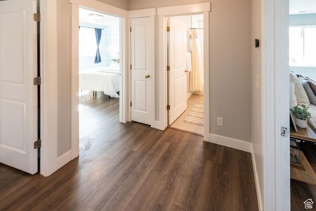 7390 N Pawnee Rd, Eagle Mountain, UT 84005 - corridor with dark wood finished floors