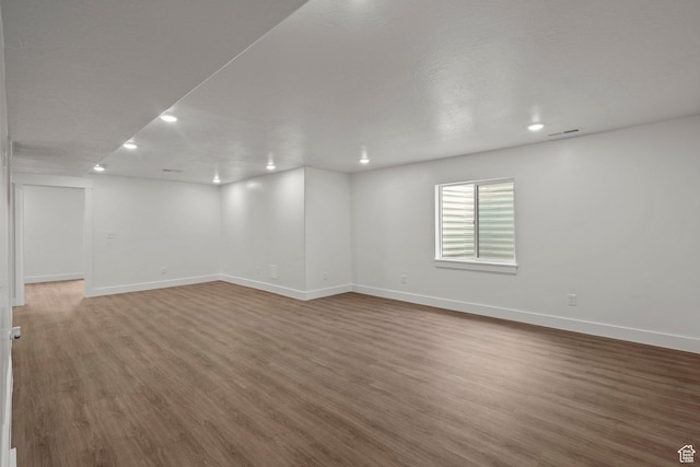 3873 E S Pass Cv, Eagle Mountain, UT 84005 - spare room with recessed lighting and wood finished floors
