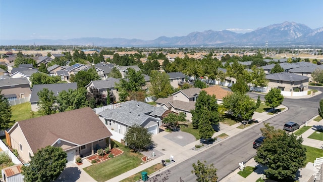4974 W Diamondback Dr, Riverton, UT 84096 - aerial perspective of suburban area featuring a mountainous background