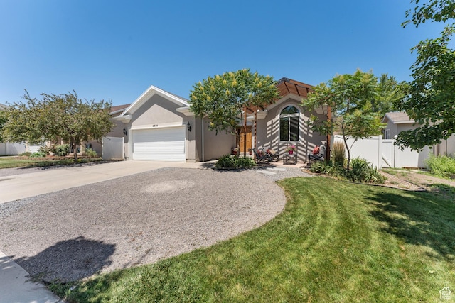 4974 W Diamondback Dr, Riverton, UT 84096 - view of front facade featuring stucco siding, driveway, and a garage