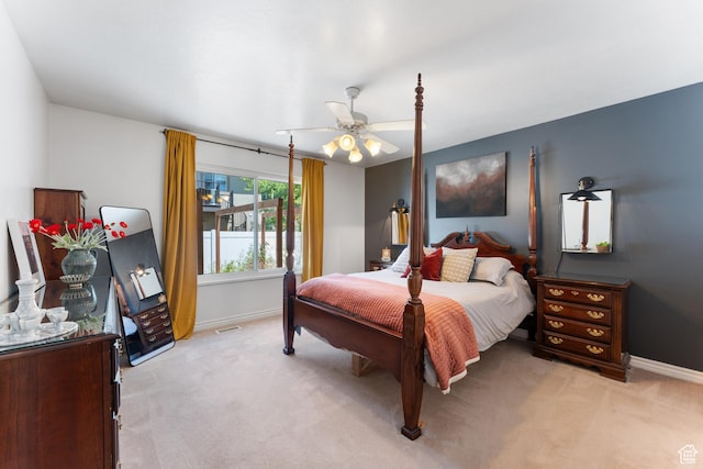 4974 W Diamondback Dr, Riverton, UT 84096 - bedroom with light colored carpet and ceiling fan