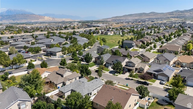 4974 W Diamondback Dr, Riverton, UT 84096 - aerial overview of property's location featuring nearby suburban area and a mountain backdrop