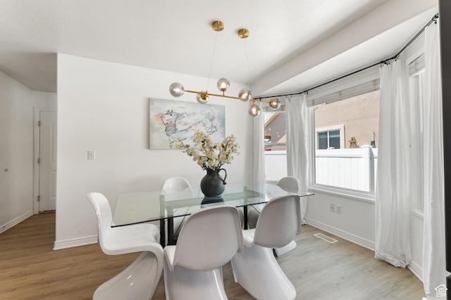 4974 W Diamondback Dr, Riverton, UT 84096 - dining space featuring light wood-style flooring and baseboards