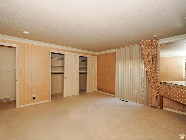 4893 S Regency St, Holladay, UT 84117 - unfurnished bedroom with ornamental molding, carpet, and a textured ceiling