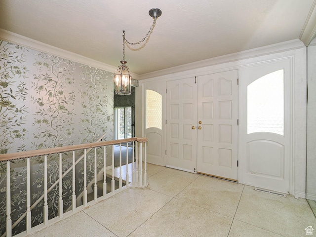 4893 S Regency St, Holladay, UT 84117 - foyer with crown molding and a chandelier