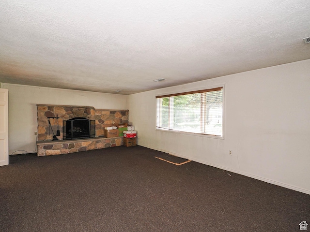 4893 S Regency St, Holladay, UT 84117 - carpeted living room with a textured ceiling and a fireplace