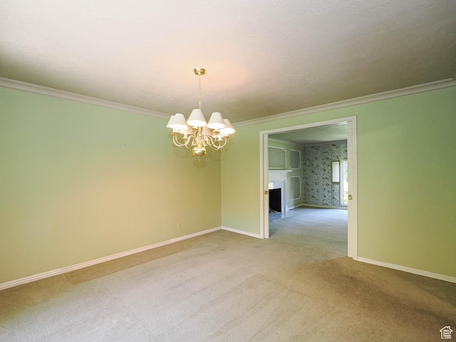 4893 S Regency St, Holladay, UT 84117 - carpeted empty room featuring a chandelier, crown molding, and a fireplace