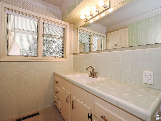 4893 S Regency St, Holladay, UT 84117 - bathroom featuring ornamental molding, vanity, tile walls, decorative backsplash, and a chandelier