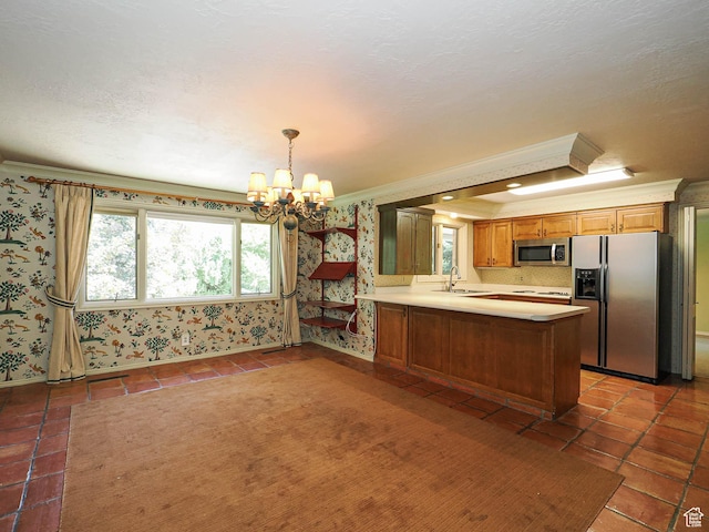 4893 S Regency St, Holladay, UT 84117 - kitchen featuring stainless steel appliances, wallpapered walls, ornamental molding, a chandelier, and light countertops