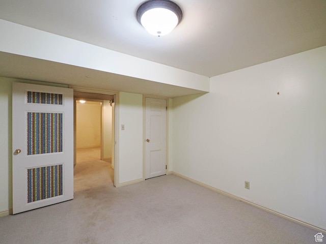 4893 S Regency St, Holladay, UT 84117 - finished basement featuring light colored carpet and baseboards