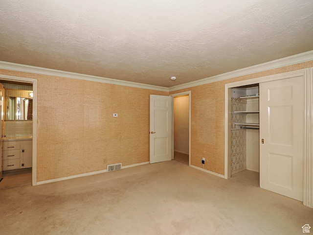 4893 S Regency St, Holladay, UT 84117 - unfurnished bedroom with carpet floors, crown molding, a closet, connected bathroom, and a textured ceiling
